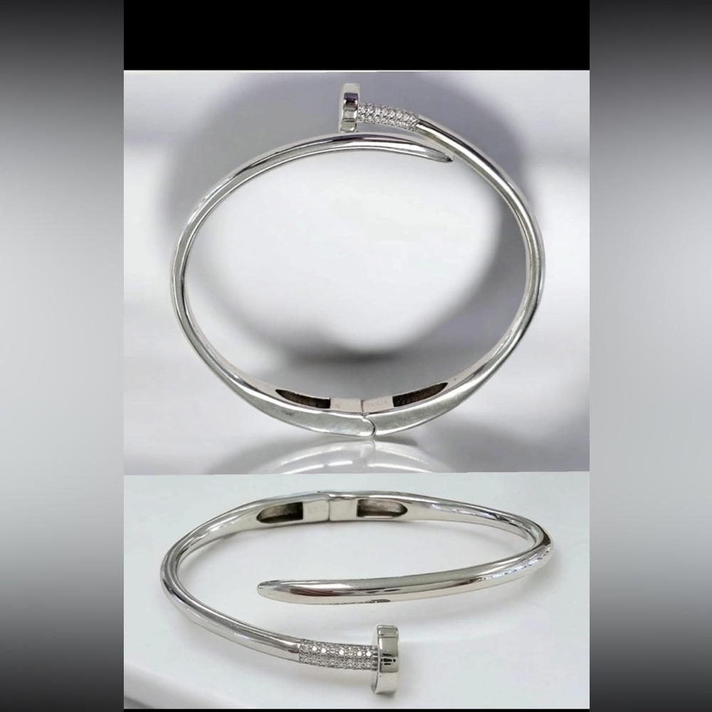 THESE ARE WELL MADE
Sterling Silver Hinge Cr Wht Sapphire Hammer/ Nail Bangle